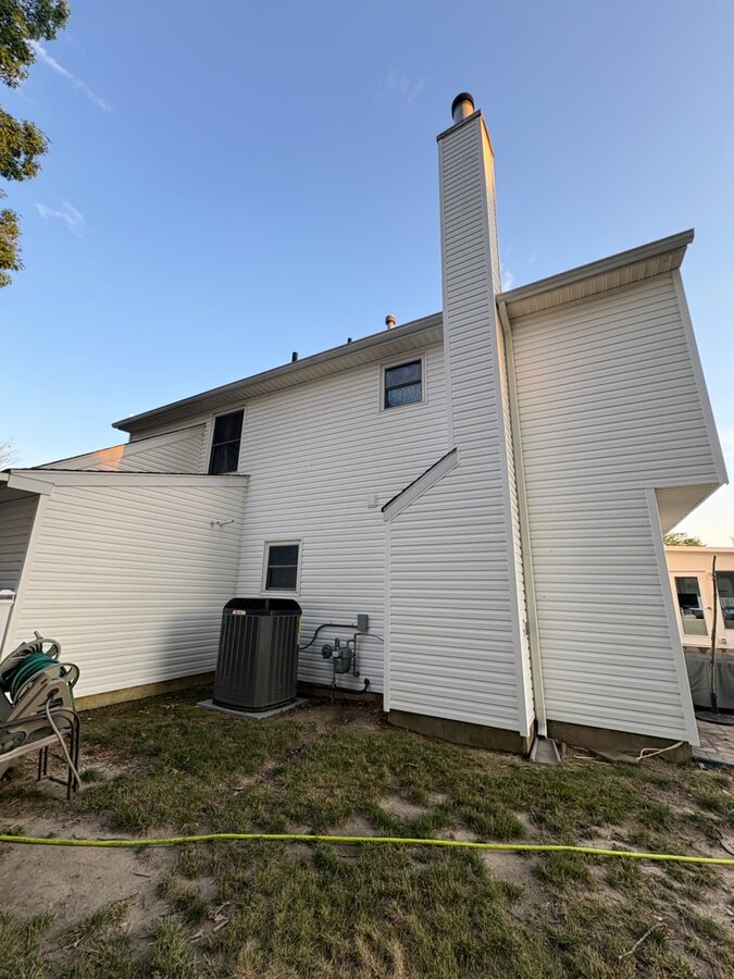 Home siding after soft washing — bright, clean white