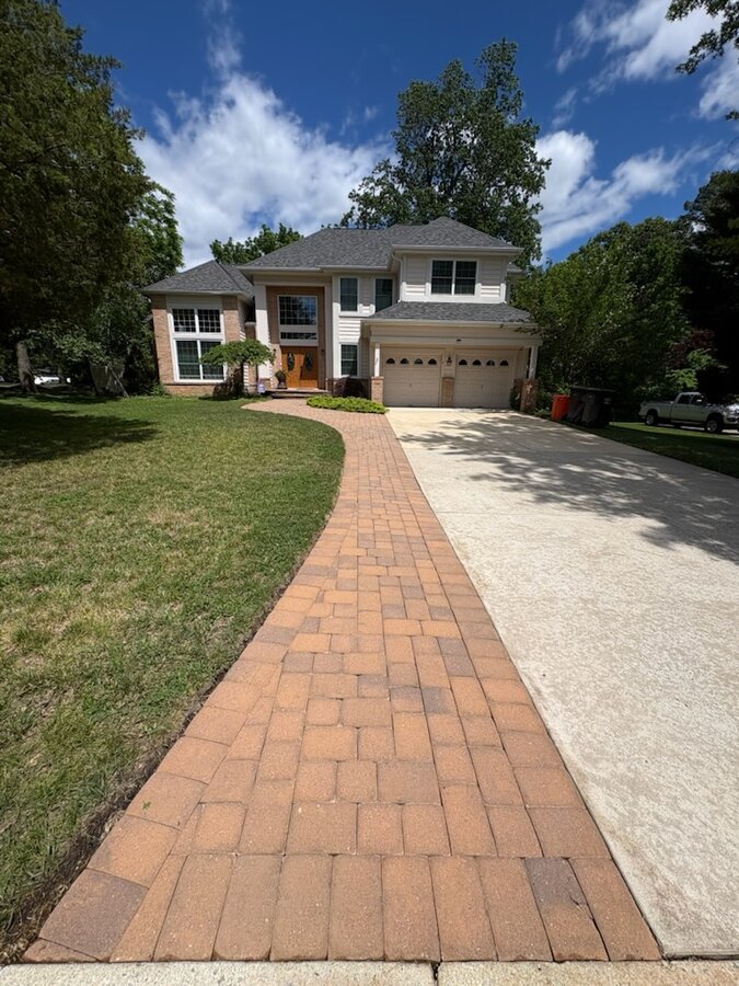Paver walkway after cleaning and resealing — rich, vibrant color