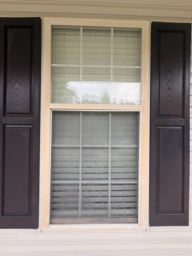 Window and shutters before soft washing — faded and dirty